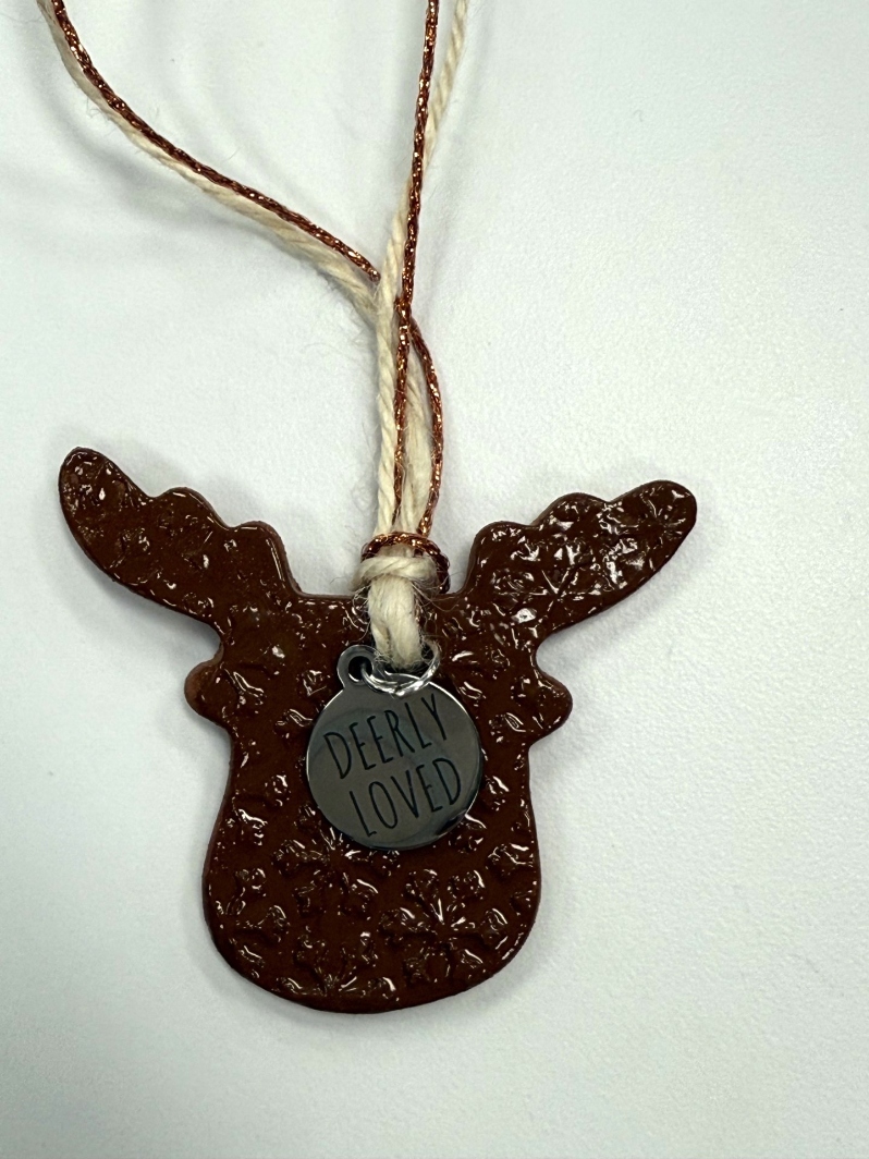 Product Description: Brown deer ornament with "Deerly Loved" Charm</br> Deerly Loved Ornament